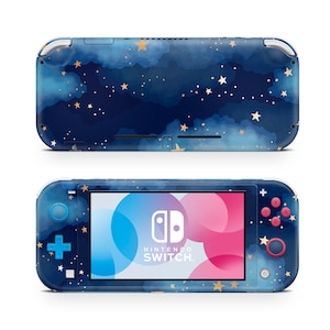 May include: A blue and gold Nintendo Switch Lite console with a starry night sky design. The console has a white border and a pink and blue screen.