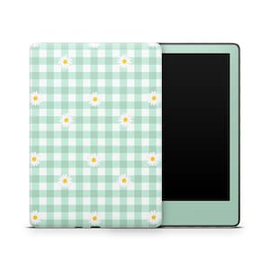 May include: A mint green and white gingham pattern with small white daisies on a Kindle e-reader cover.