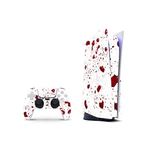 Pode incluir: Uma consola de jogos branca e um comando sem fios a condizer, ambos com um padrão gráfico de salpicos de tinta vermelha nas suas superfícies. A consola está na vertical e o comando está posicionado à sua esquerda.