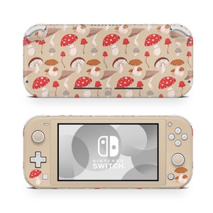 May include: A beige Nintendo Switch Lite console with a mushroom pattern skin. The console has a white screen and the Nintendo Switch logo is visible on the screen.