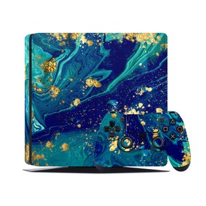 May include: A blue and green PlayStation 5 console and controller skin with gold accents. The design features a marbled pattern with gold flecks.