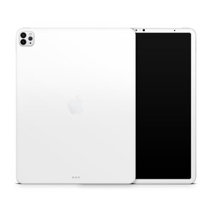 Op de afbeelding: Een witte iPad met een zwart scherm en een camera aan de achterkant.