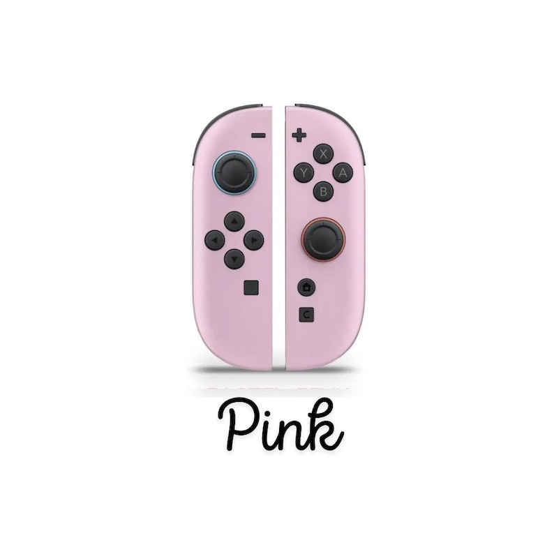May include: Two pink game controllers with black buttons and joysticks. The controllers are displayed side by side, with the word "Pink" in cursive script beneath. The design is sleek and modern.