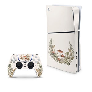May include: White PlayStation 5 console and controller with a forest-themed design featuring ferns and mushrooms. The design is in shades of green, brown, and white.