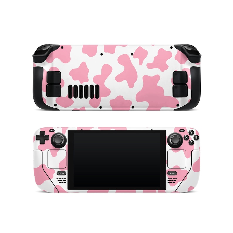 May include: A pink and white cow print skin for a handheld gaming console. The skin covers the front and back of the console, including the buttons and joysticks.