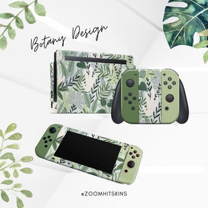 Könnte beinhalten: Eine grüne und weiße Nintendo Switch Konsole und ein Controller mit einem botanischen Design mit Blättern und Blumen. Der Text "Botany Design" ist in Weiß auf grünem Hintergrund geschrieben. Der Text "@ZOOMHITSKINS" ist in Weiß auf grünem Hintergrund geschrieben.