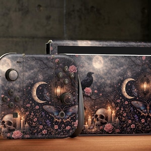 May include: A custom-designed Switch console and dock featuring a dark, gothic-inspired design. The artwork includes moons, skulls, roses, candles, and a crow against a dark, atmospheric background. The design covers the console and dock.
