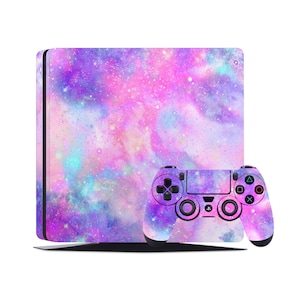 May include: A pink, purple, and blue galaxy-themed skin for a Playstation 4 console and controller.