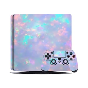 May include: A white PlayStation 4 console and controller with an iridescent opal pattern.