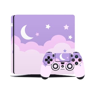 May include: Purple and pink PlayStation 4 console and controller skin with a moon, clouds, and stars design.