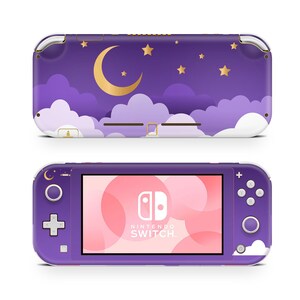 May include: Purple Nintendo Switch Lite console with a custom skin featuring a crescent moon, stars, and clouds on a purple background. The text "NINTENDO SWITCH" is visible on the screen.