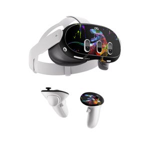May include: A white virtual reality headset with a black faceplate featuring a colourful dinosaur graphic. The headset comes with two white controllers, each with a matching dinosaur graphic.
