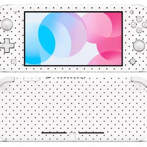 May include: A white handheld gaming console with a black polka dot pattern. The screen displays a colorful abstract design. The console's buttons and controls are visible, and the back of the device is also shown.