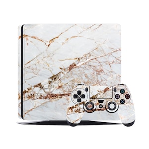 May include: A white and brown marble-patterned gaming console and controller set. The console is rectangular, and the controller has a standard button layout. The design features a natural stone aesthetic.
