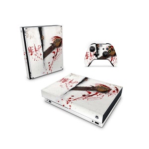 May include: Xbox One console and controller skin featuring a white background with red blood splatters and a chainsaw breaking through the wall with the word "HELP" written in red.