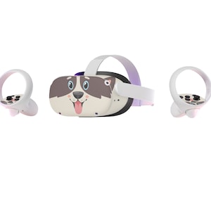May include: A white virtual reality headset with a dog face design on the front. The headset comes with two white controllers.