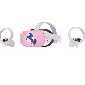 May include: A pink and white virtual reality headset with a unicorn design. The headset comes with two white controllers.