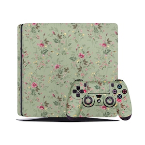 Op de afbeelding: Een groene en roze bloemenprint skin voor een Playstation 4 console en controller.