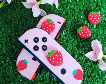 Empuñaduras de silicona con forma de fresa dulce para los pulgares, decoración de videojuegos estilo cottagecore en tonos pastel, tapas para Joy-Con con forma de fruta.