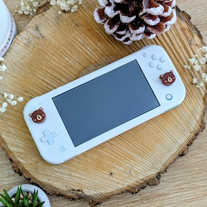 Adesivo de vinil premium 3M na cor natural para console de jogos, compatível com Switch Lite.