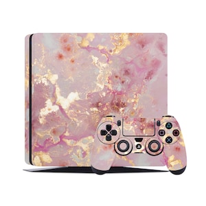 Może przedstawiać: Skórka w kolorze różowym i złotym z wzorem marmuru do konsoli Playstation 4 i kontrolera.
