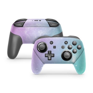 May include: A pair of Nintendo Switch controllers with a galaxy-themed design. The controllers are a light blue and purple color with a white galaxy pattern. The controllers are shown from the front and side.