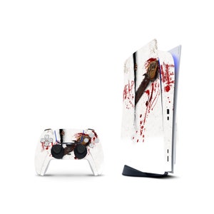 May include: A white PlayStation 5 console with a custom skin featuring a bloody, graphic design with the word "HELP" and a figure holding a chainsaw. The console is next to a white PlayStation 5 controller with a matching design.