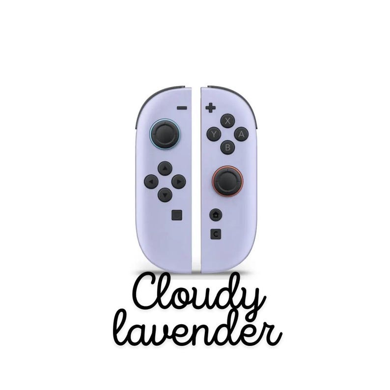 May include: A pair of 'Cloudy lavender' coloured game controllers, each with black buttons and joysticks. The controllers feature a minimalist design with a plus sign, minus sign, and lettered buttons. The text "Cloudy lavender" is written below.
