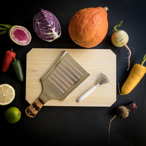 A picture shows Japanese grater, Oroshigane, and grated Japanese radish,  daikon-oroshi, in Tokyo on May