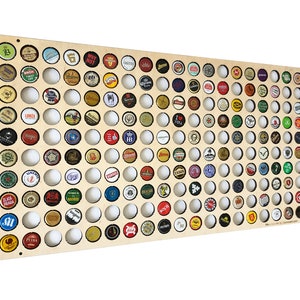 May include: A wooden board with 100 circular cutouts for displaying bottle caps. The board is filled with a variety of colorful bottle caps, each with a different logo or design.