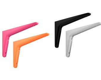 May include: Four L-shaped shelf brackets in bright pink, vibrant orange, solid black, and clean white. Each bracket features a triangular support structure with pre-drilled screw holes along the vertical and horizontal arms for mounting.