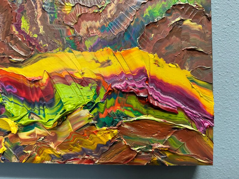 Puede incluir: Pintura al &oacute;leo abstracta con pinceladas gruesas. La obra presenta una paleta de colores vibrantes, incluyendo amarillo, verde, rojo y marr&oacute;n. La superficie texturizada crea una experiencia visual din&aacute;mica y t&aacute;ctil. La composici&oacute;n sugiere un paisaje.