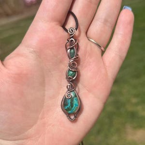 May include: A set of three ceramic mugs with a speckled, matte finish. The mugs are in shades of cream, light gray, and dark gray. Each mug has a simple, minimalist design, perfect for coffee or tea.