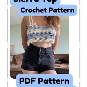 May include: A crochet top with blue and cream stripes, with the text "Sierra Top Crochet Pattern" and "PDF Pattern". The top has cream-colored straps and is worn with black denim shorts. The pattern is by @rct.crafting.