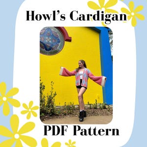 May include: A pink, blue, and white cardigan with wide sleeves is featured in this image. The text "Howl's Cardigan" and "PDF Pattern" are displayed. The background includes a yellow wall and blue accents, with decorative yellow flowers.