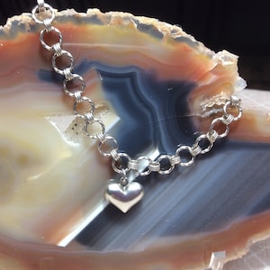 Sterling silver round flat link starter charm bracelet with puffy heart charm