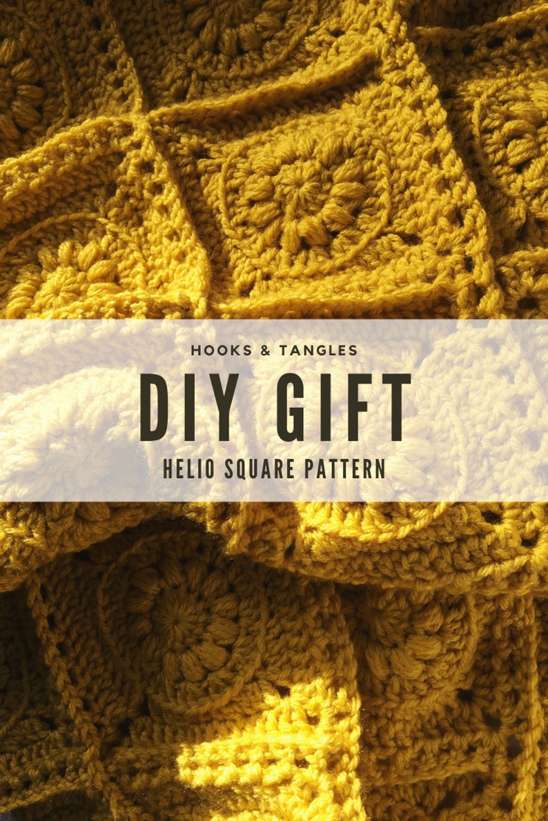 May include: Close-up of a mustard yellow crocheted blanket. The blanket is made of square patterns with a floral design in the center. Text on the image reads "HOOKS & TANGLES DIY GIFT HELIO SQUARE PATTERN".