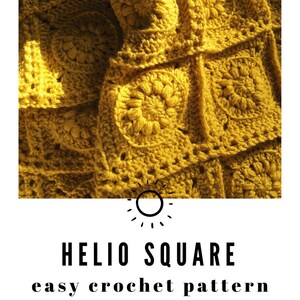 May include: Close-up of a mustard yellow crocheted blanket. The blanket is made of square panels with a floral design in the center of each square. The text "HELIO SQUARE easy crochet pattern" is displayed.