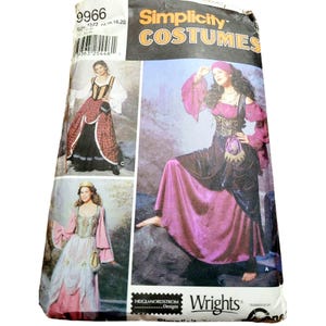 May include: A Simplicity Costumes sewing pattern packet featuring images of medieval-style dresses. The packet includes images of women wearing various costume designs, with a focus on flowing skirts and detailed bodices. The packet has the number 9966 on it.