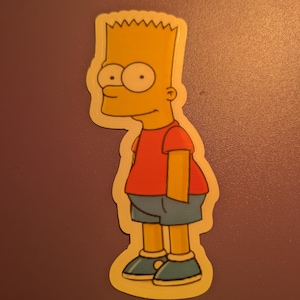 May include: A die-cut sticker featuring Bart Simpson from The Simpsons. The cartoon character is depicted in his signature outfit: a red t-shirt, blue shorts, and blue shoes. His yellow hair is spiky, and he has large, round eyes.