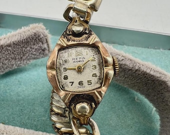 Reloj de pulsera vintage MEPA de 17 joyas en tono bronce dorado con caja Weisfield