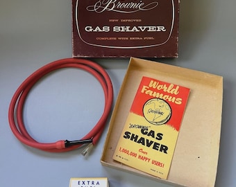 Afeitadora de gas Brownie, regalo divertido y original (19565), en caja con combustible extra (sin maquinilla).