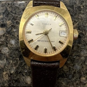 Vintage Women&#39;s Timex Gold Tone Brown Band Water Resistant w/ Date Wrist Watch
