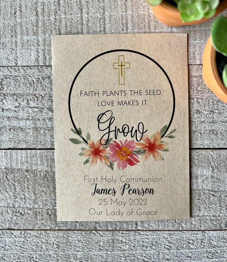 May include: A brown card with a gold cross and floral wreath. The text reads "Faith plants the seed, love makes it grow. First Holy Communion James Pearson 25 May 2022 Our Lady of Grace."