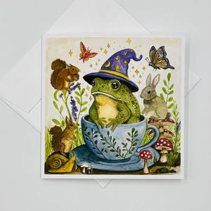 Carte de voeux lunatique tasse de thé grenouille forestière