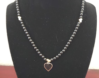 Hematite Beaded Necklace with Gold Heart Pendant.