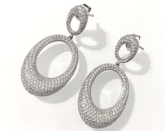 Women's Oval Hoop Silver earrings .
