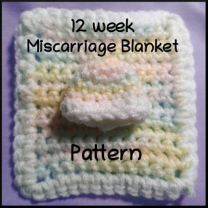 May include: A white crocheted baby blanket with a matching hat in pastel colors. The blanket has a striped pattern and the text "12 week Miscarriage Blanket Pattern" is written on it.