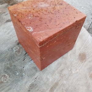 Cube in red travertine