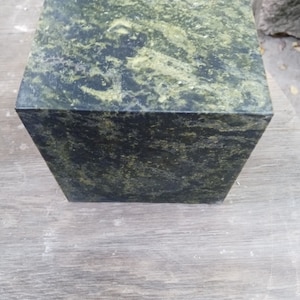Green marble cube
